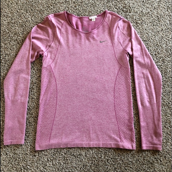 pale pink nike shirt